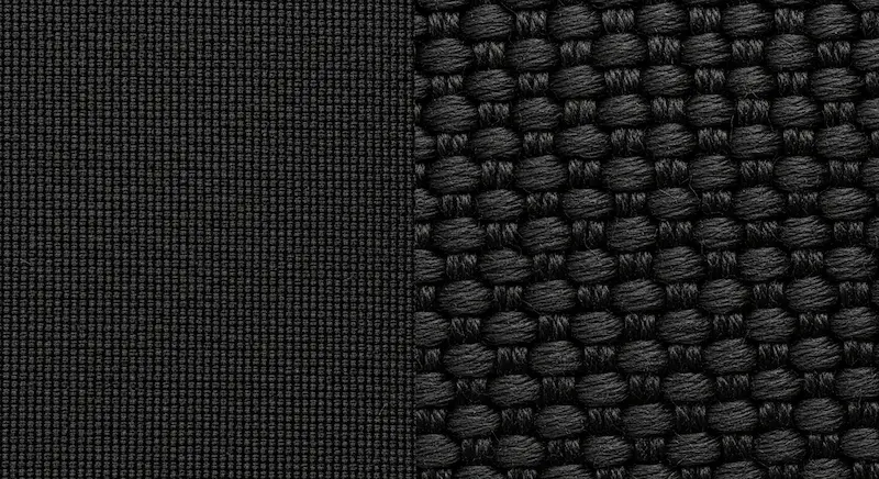 A macro close-up comparison of 600D Polyester texture versus robust 1680D Ballistic Nylon texture for custom backpacks.